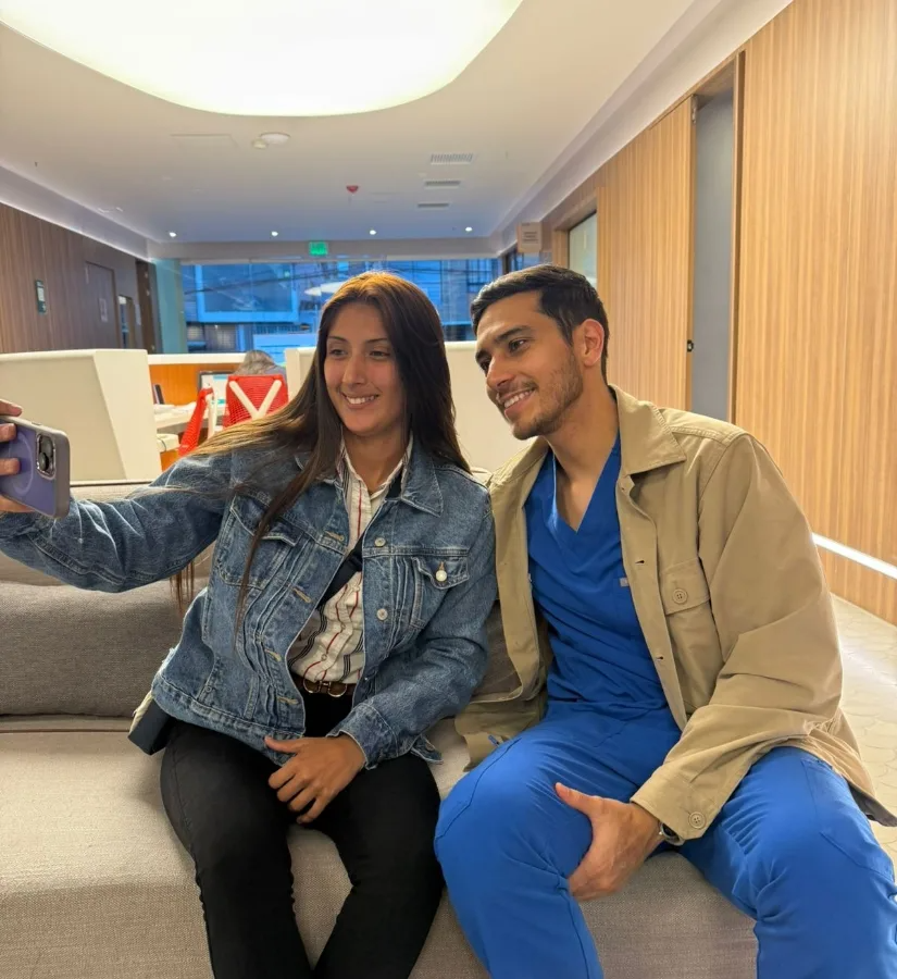 Dr. Manuel with a patient inside the clinic